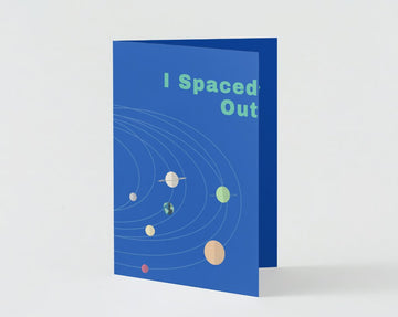 Front of Galactic Forgiveness apology card with space-themed design